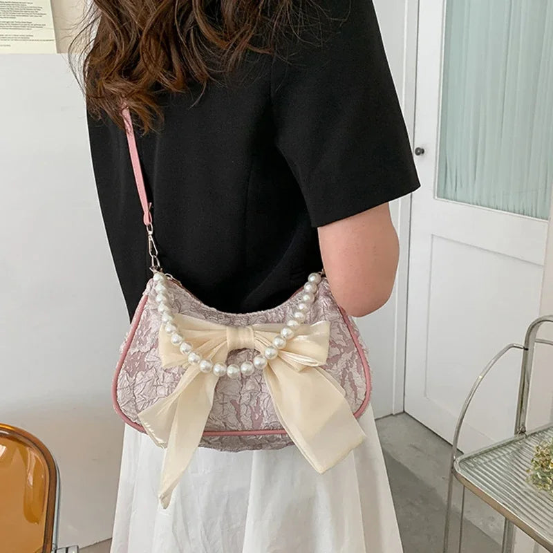 White Folds Pop Retro Bow Bag | Female Pearl Handle New Fashion Pearl Armpit Shoulder & Crossbody Bag Luxegan