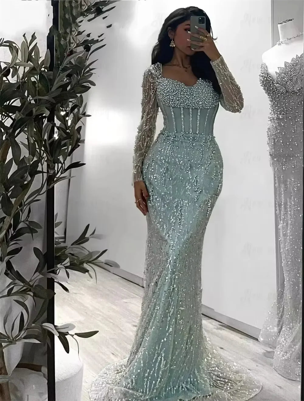 Luxury Mint Green Mermaid Evening Gown | Dubai Heavy Beaded Pearls Formal Party Dress | Exquisite Long Sleeve Illusion Corset Prom Gown | Sequin Satin Ankle-Length Trumpet Dress Luxegan