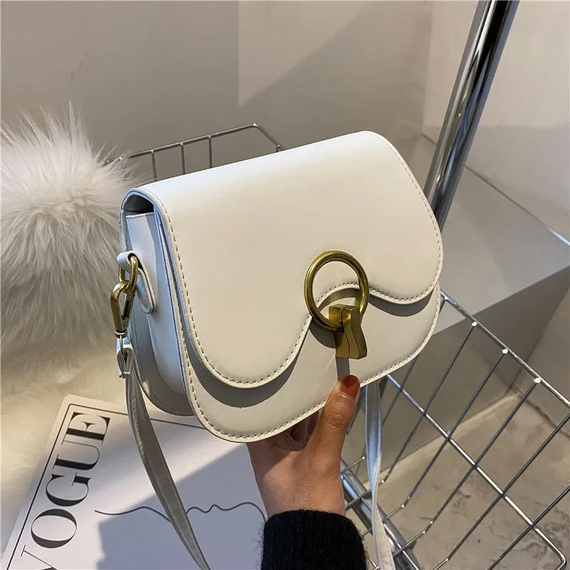 PU Leather Saddle Bag with Fashion Lock | Solid Color Flap Crossbody Purse Luxegan