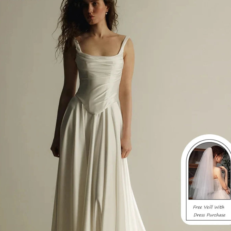 Elegant Lustrous Satin A-Line Wedding Dress | Simple Spaghetti Strap Square Neck Bridal Gown | Classic Pleated Floor-Length Bride Dress | Model M1-250707-10 Custom Lace-Up Gown Luxegan