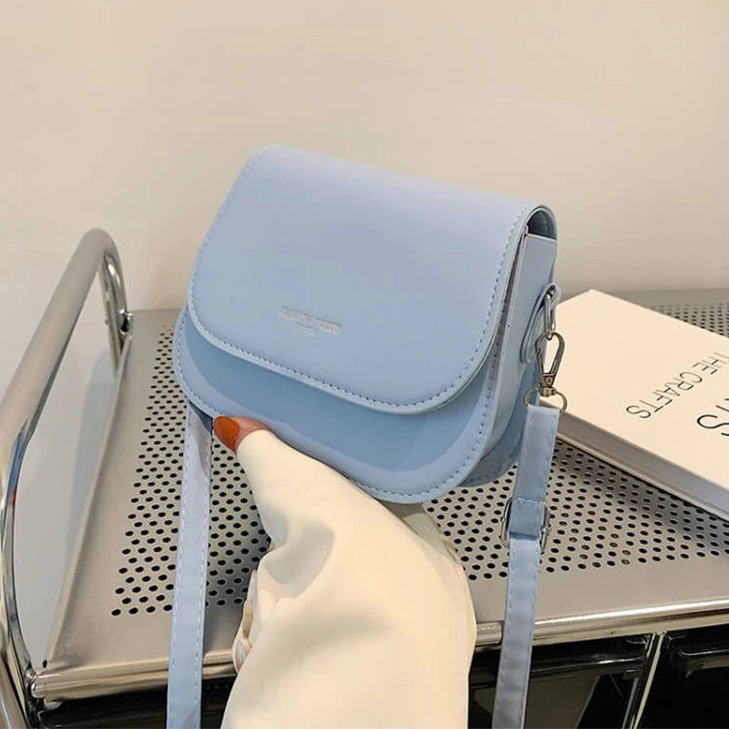 Trendy Saddle Shoulder Bag for Women | Sophisticated PU Leather Crossbody | Simple Solid Color Flap Messenger Bag | Fashion-Forward Designer Pouch for Versatile Daily Matching Luxegan