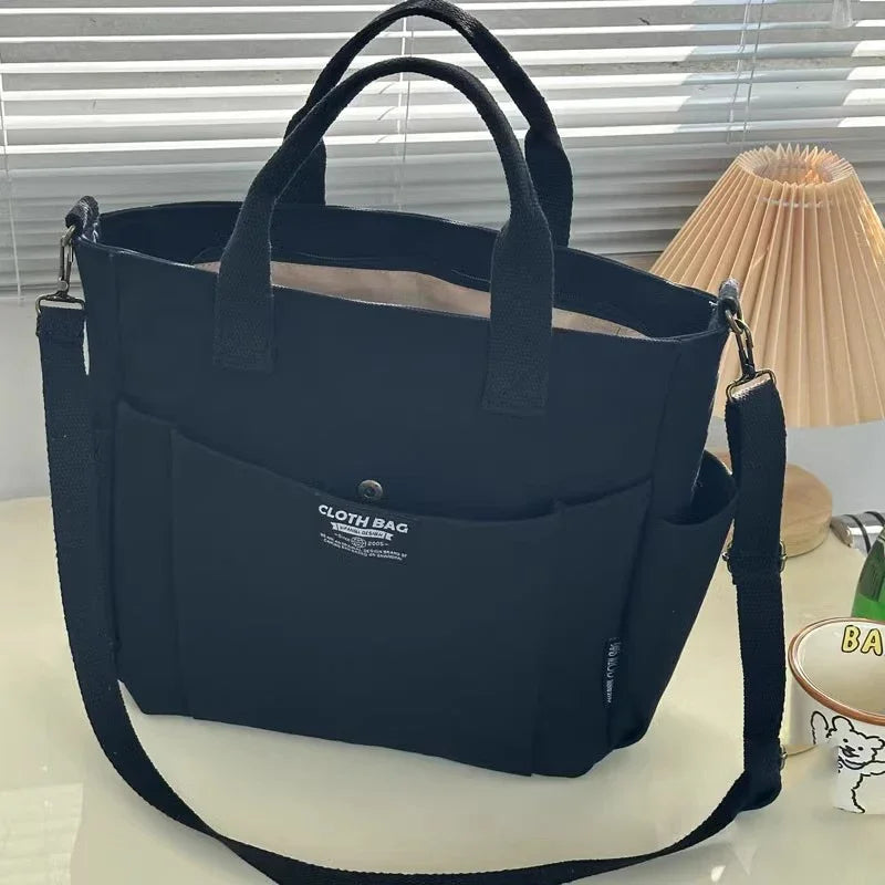 Urban Minimalist Female Student Tote Bag | Sophisticated Large Capacity Commuting Canvas Bag | Elegant Horizontal Single Shoulder & Diagonal Crossbody | Fashion-Forward Portable Portable Canvas Satchel Luxegan