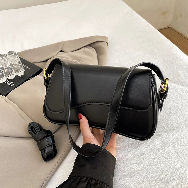 Structured Convertible Saddle Bag | Versatile Crossbody & Handbag Luxegan