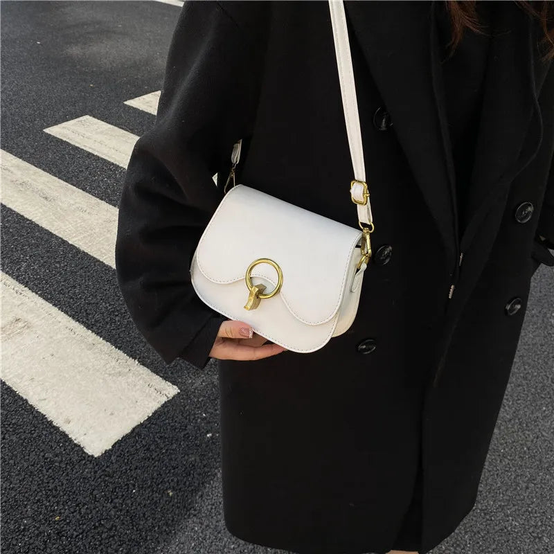 PU Leather Saddle Bag with Fashion Lock | Solid Color Flap Crossbody Purse Luxegan