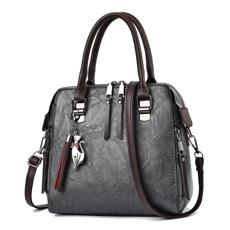 Hard Vintage PU Leather Tote | Tassel Top-handle & Luxury Shoulder Bag Luxegan