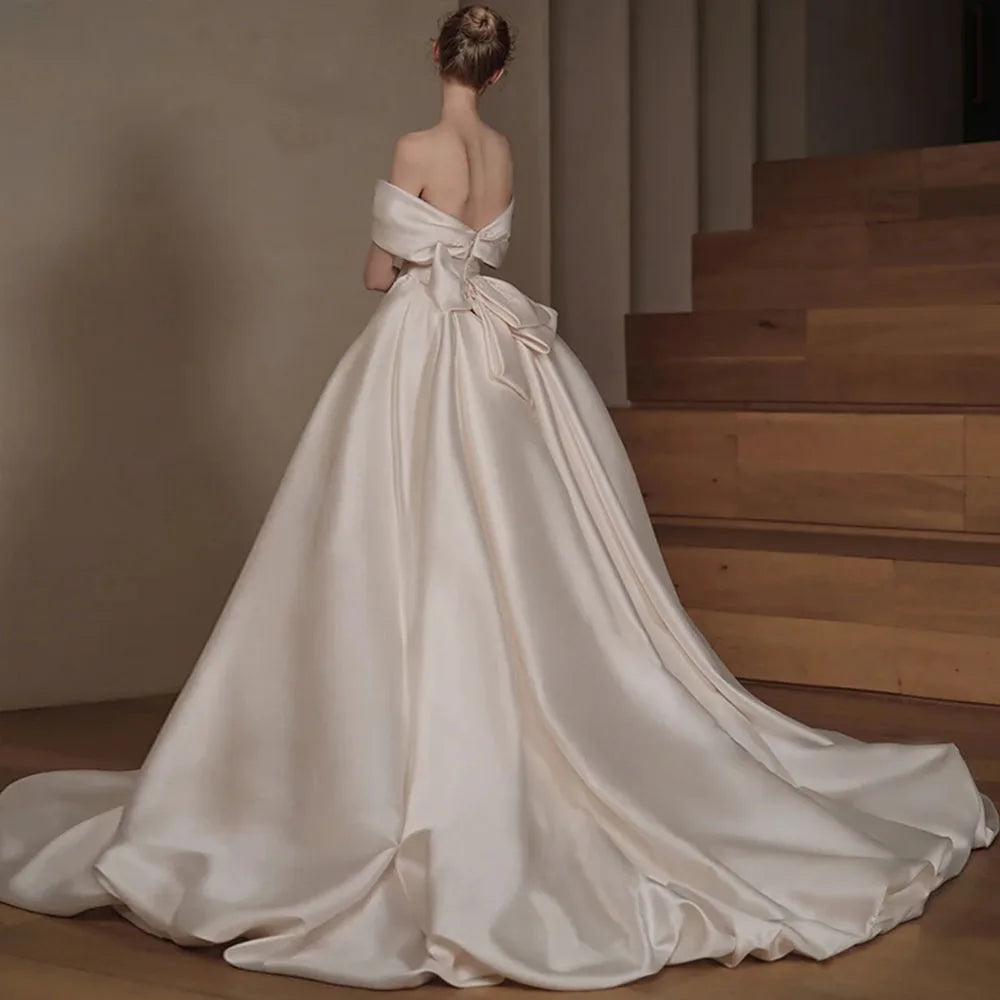 Luxury 2-Piece Satin Mermaid Wedding Dress | Off-The-Shoulder Beaded Bow Bridal Gown | Sweetheart Neck Floor-Length Trumpet Dress with Detachable Train