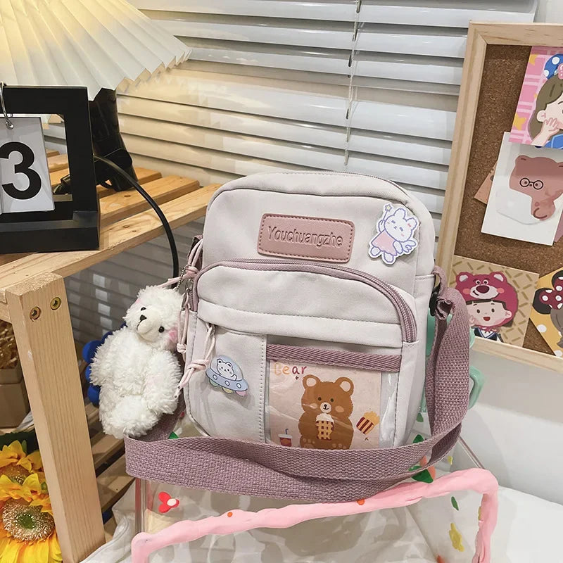 Cute Clear Kawaii Canvas Bag | Harajuku Cartoon Messenger Bag for Girls | Sophisticated Small Patchwork Shoulder Pouch | Fashion-Forward Nylon Cellphone Purse with Silt Pocket Luxegan