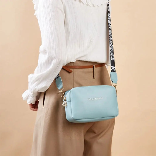 Simple Designer Wide Letter Strap Handbag | Sophisticated PU Leather Square Shoulder Bag | Elegant Small Phone Crossbody Purse | Fashion-Forward Travel Sac for Women & Unisex Styling Luxegan