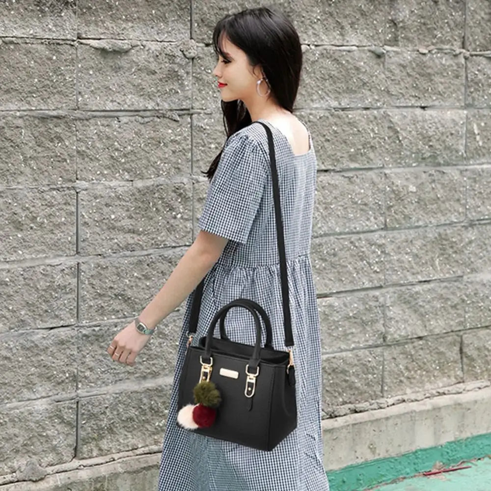 Casual Fashion Embossed Shoulder Bag | Large Capacity PU Leather Crossbody | Unisex Solid Color Tote Handbag | Trendy Satchel with Feather Pendant Luxegan