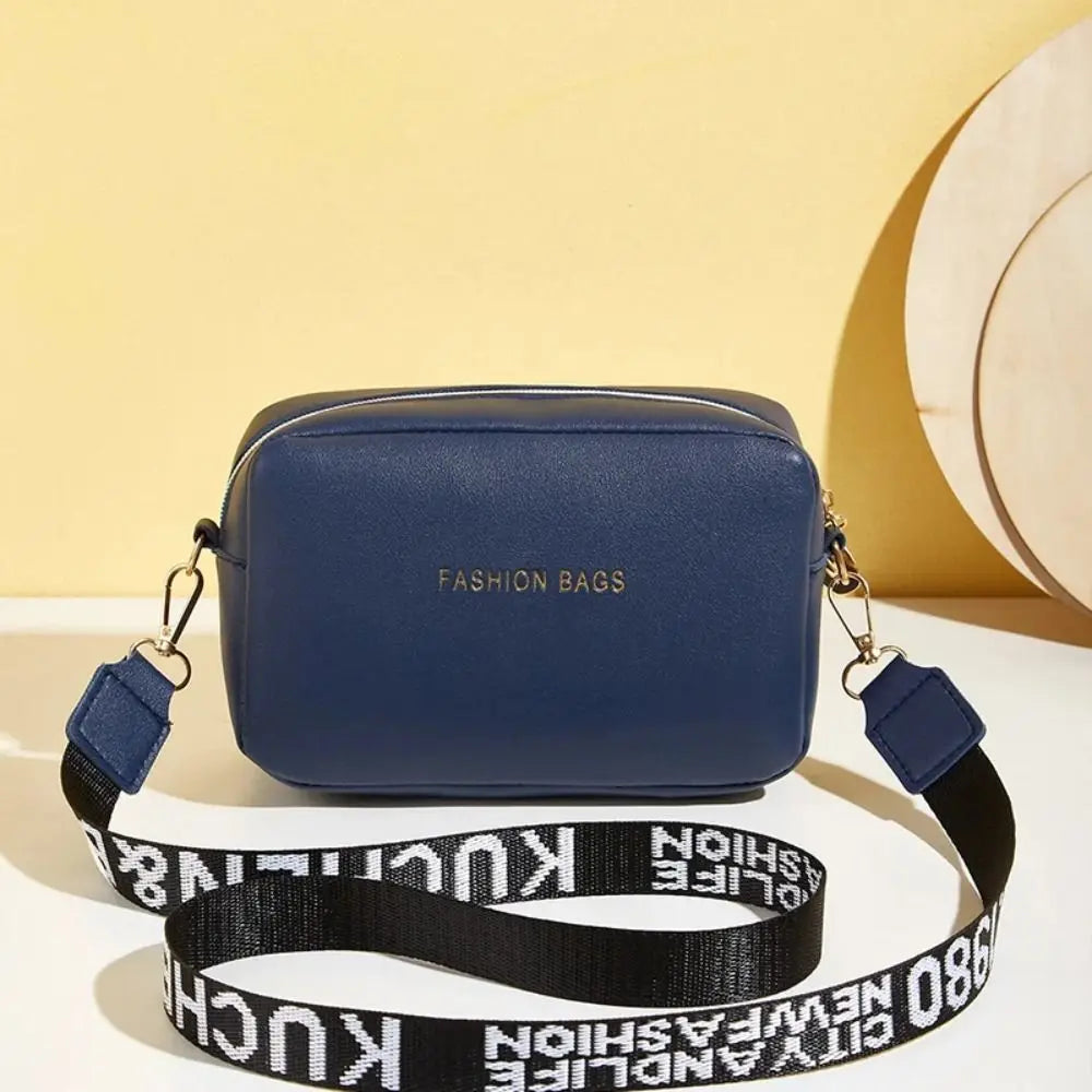 Simple Designer Wide Letter Strap Handbag | Sophisticated PU Leather Square Shoulder Bag | Elegant Small Phone Crossbody Purse | Fashion-Forward Travel Sac for Women & Unisex Styling Luxegan