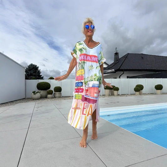 Women's European and American Vacation Long Dress | Elegant Temperament V-Neck Short-Sleeve Midi Purse | Casual Side-Split Printed A-Line Dress | Premium All-Season Pullover Model YMF6624 Luxegan