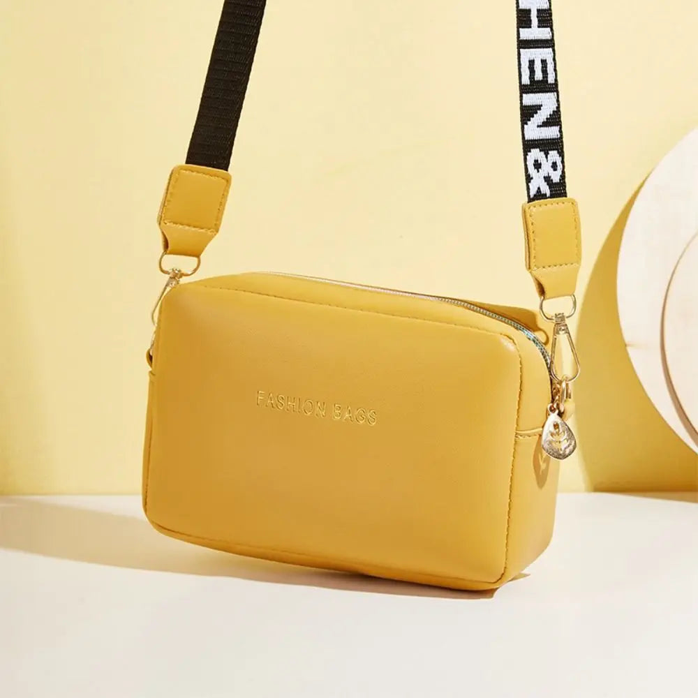 Simple Designer Wide Letter Strap Handbag | Sophisticated PU Leather Square Shoulder Bag | Elegant Small Phone Crossbody Purse | Fashion-Forward Travel Sac for Women & Unisex Styling Luxegan