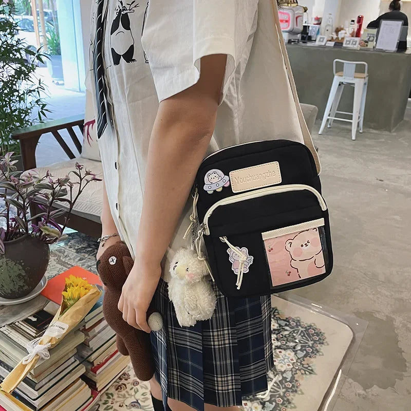 Cute Clear Kawaii Canvas Bag | Harajuku Cartoon Messenger Bag for Girls | Sophisticated Small Patchwork Shoulder Pouch | Fashion-Forward Nylon Cellphone Purse with Silt Pocket Luxegan