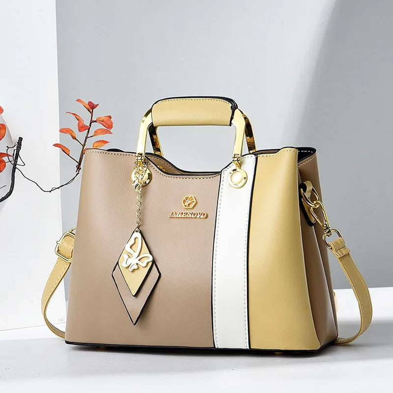 Women’s Fashion Cat-Themed Satchel | Sophisticated Top-Handle Handbag | Fashion-Forward Patchwork Shoulder Bag | Elegant Crossbody Purse with Tassel Decoration Luxegan