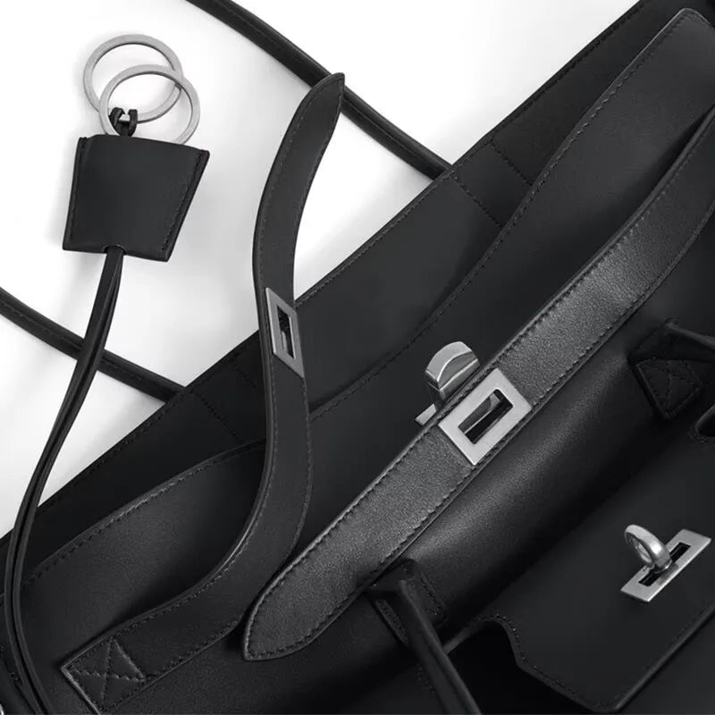 Luxury Real Leather Tote Bag Brand Texture Lock Wing Bag Solid Color Simple New Horizontal Square Bag Women's Commuter Handbag