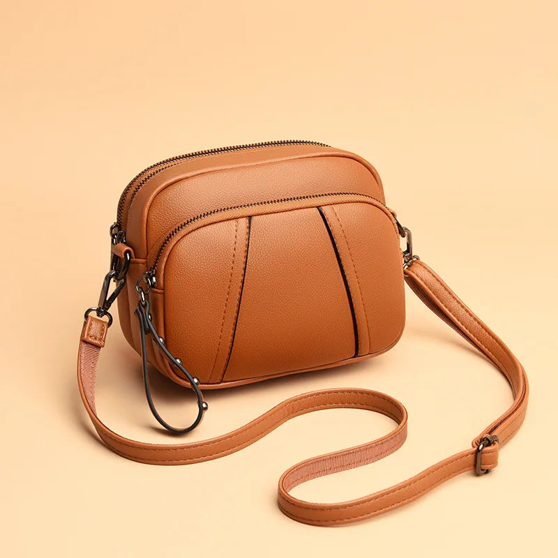 Fashionable Rivet-Accent Mobile Phone Bag | Sophisticated Solid-Color Shell Handbag | Elegant Soft PU Leather Crossbody | "Dignified" Small Square Purse for Versatile Daily Styling Luxegan