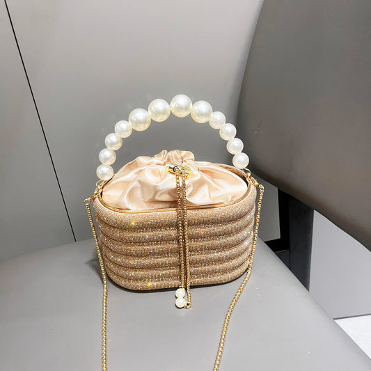 Luxury Designer Rhinestone Evening Clutch Bag | Shiny Crystal Bucket Purse with Metallic Handle | Shimmering Metallic Wedding & Party Handbag | Glamorous Crystal-Encrusted Shoulder Bag Luxegan