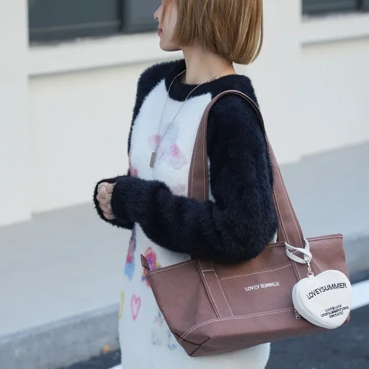 Bolso de lona de gran capacidad | Elegante bolso tote de color liso | Elegante bolso de mano con cierre de cremallera | Bolso con detalles de cuero para un estilo radiante y versátil