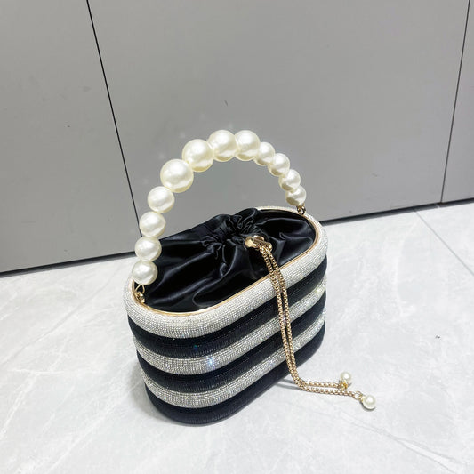 Luxury Designer Rhinestone Evening Clutch Bag | Shiny Crystal Bucket Purse with Metallic Handle | Shimmering Metallic Wedding & Party Handbag | Glamorous Crystal-Encrusted Shoulder Bag Luxegan