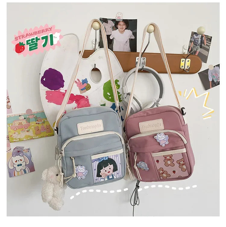 Cute Clear Kawaii Canvas Bag | Harajuku Cartoon Messenger Bag for Girls | Sophisticated Small Patchwork Shoulder Pouch | Fashion-Forward Nylon Cellphone Purse with Silt Pocket Luxegan