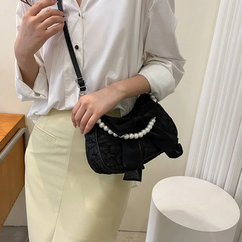 White Folds Pop Retro Bow Bag | Female Pearl Handle New Fashion Pearl Armpit Shoulder & Crossbody Bag Luxegan