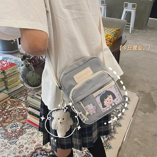 Cute Clear Kawaii Canvas Bag | Harajuku Cartoon Messenger Bag for Girls | Sophisticated Small Patchwork Shoulder Pouch | Fashion-Forward Nylon Cellphone Purse with Silt Pocket Luxegan
