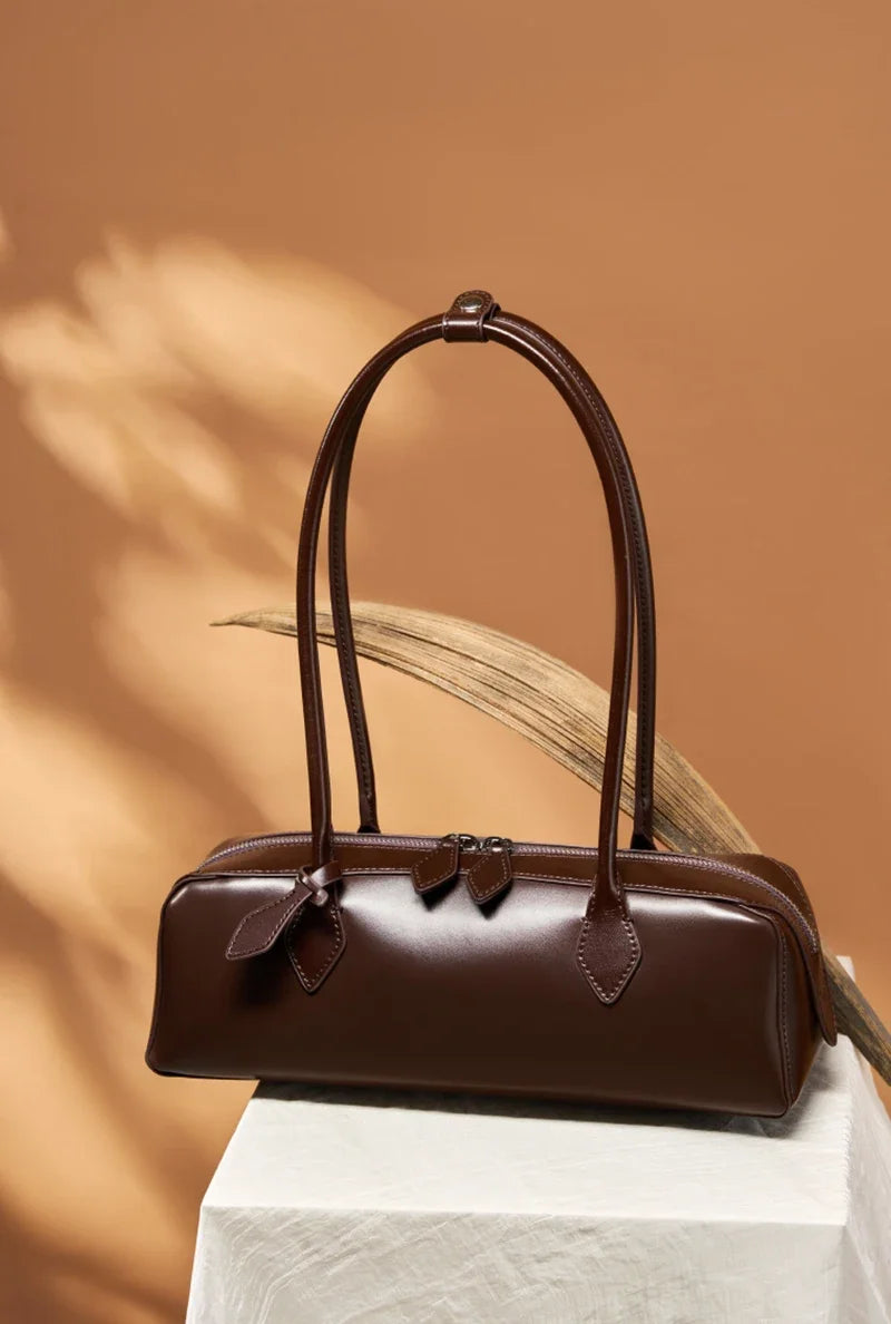 New Genuine Leather Women's Shoulder Bag | Large Capacity Cowhide Luxury Handbag (Long Strip Wine Red Baguette Bag) Luxegan