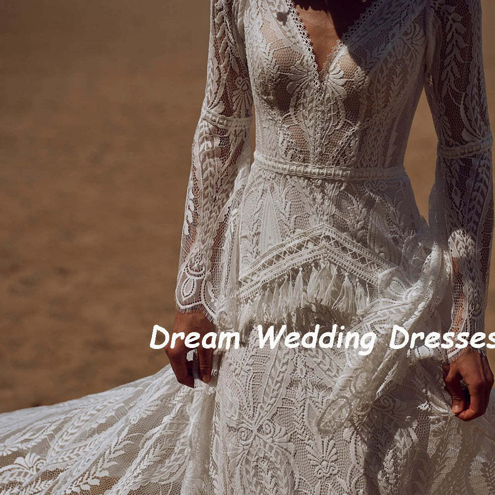Exquisite Custom V-Neck Flare Sleeve Bridal Gown | Vintage Backless Lace Mermaid Wedding Dress | Bohemian-Inspired Long Bride Dress with Ruffled Tassel Accents & Sweep Train Luxegan