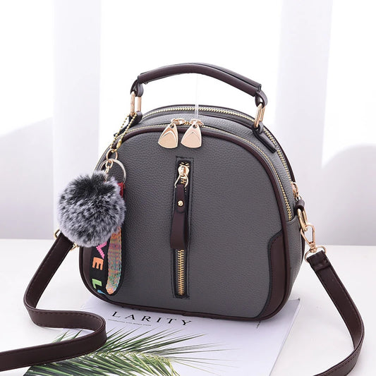 Luxury PU Leather Women's Small Tote Bag | Fashionable Fur Ball Pendant & Crossbody Bag Luxegan