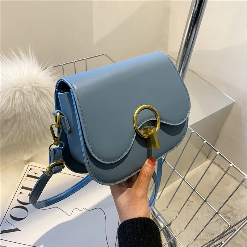 PU Leather Saddle Bag with Fashion Lock | Solid Color Flap Crossbody Purse Luxegan