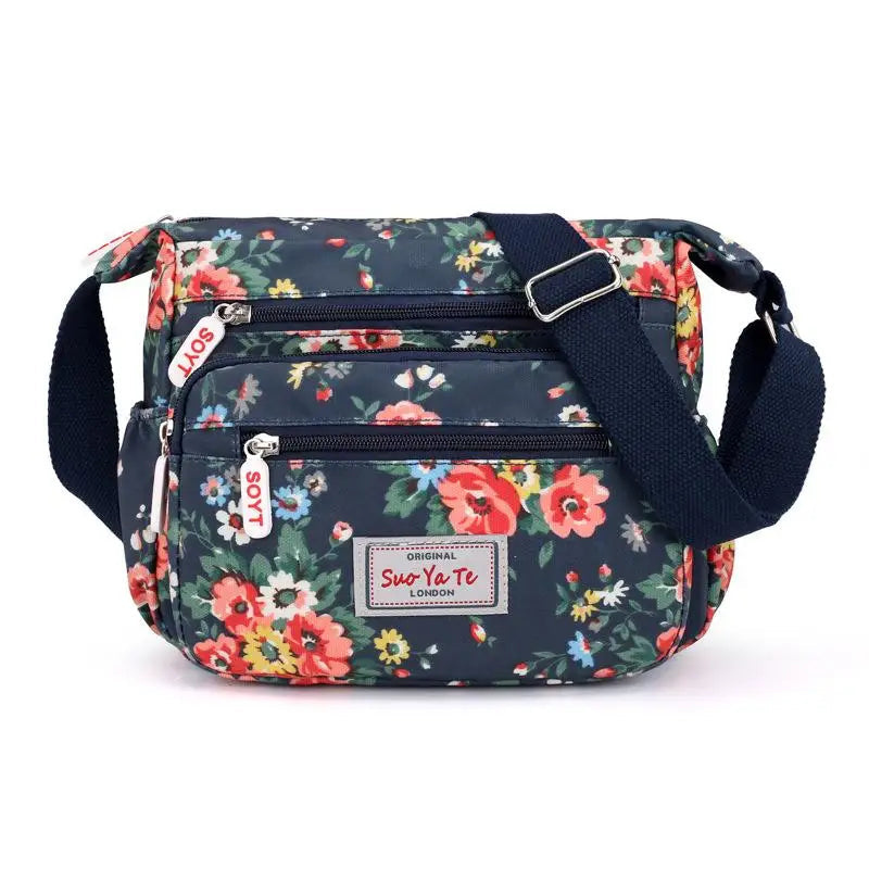 Women’s Floral Multi-Pocket Crossbody Handbag | Waterproof Canvas Shoulder Messenger Bag | Large Capacity Nylon Travel Bag for Hiking & Shopping | Durable Casual Floral Purse (Model 190417065127) Luxegan