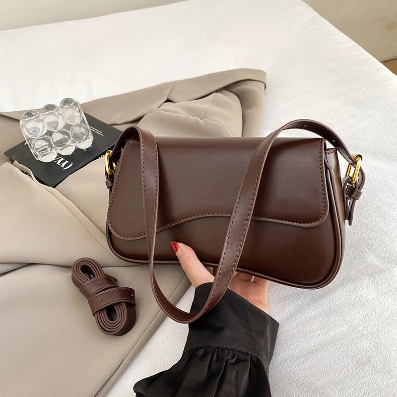 Structured Convertible Saddle Bag | Versatile Crossbody & Handbag Luxegan