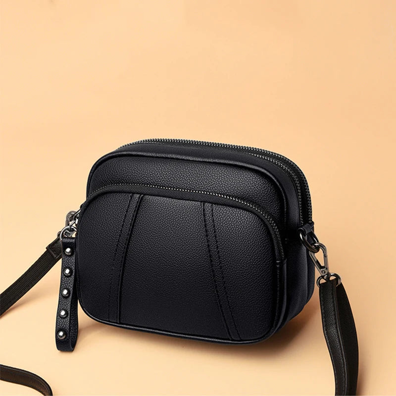 Fashionable Rivet-Accent Mobile Phone Bag | Sophisticated Solid-Color Shell Handbag | Elegant Soft PU Leather Crossbody | "Dignified" Small Square Purse for Versatile Daily Styling Luxegan