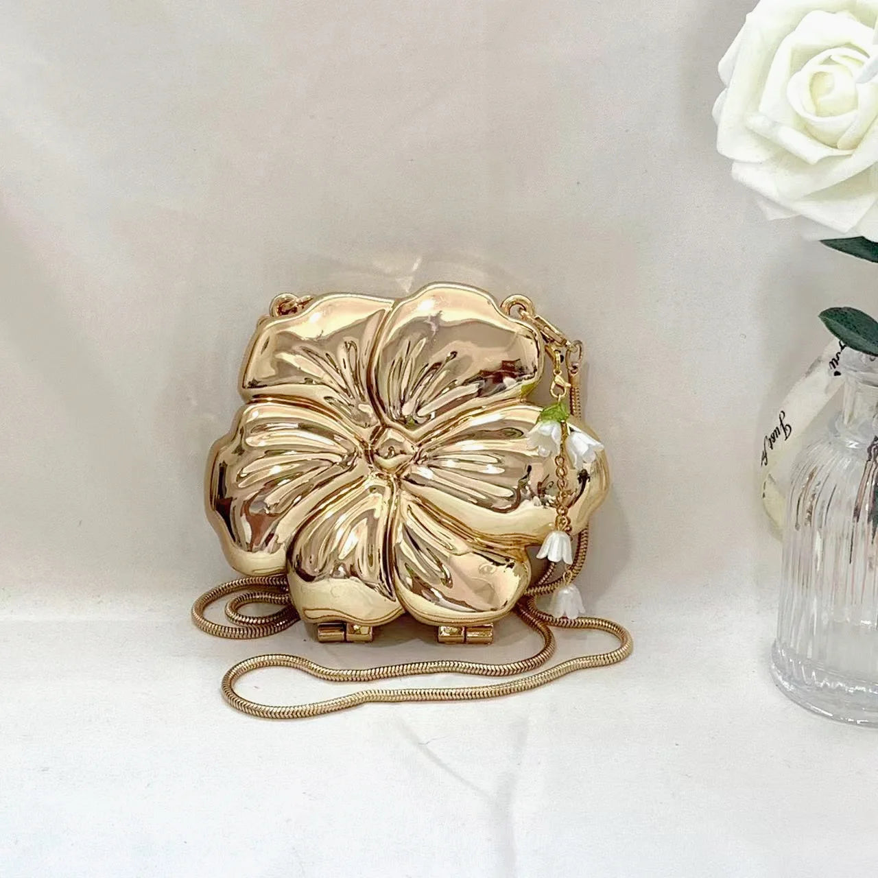 Rose Gold Acrylic Minaudiere with Lily of the Valley Charm | PVC Magnetic Messenger Bag Luxegan