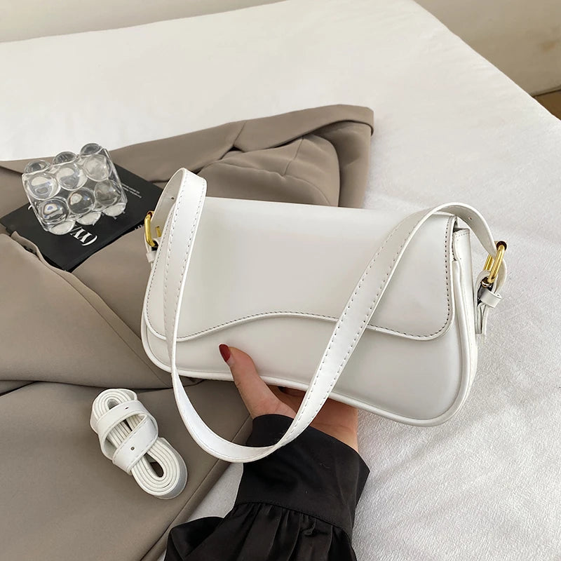 Structured Convertible Saddle Bag | Versatile Crossbody & Handbag Luxegan