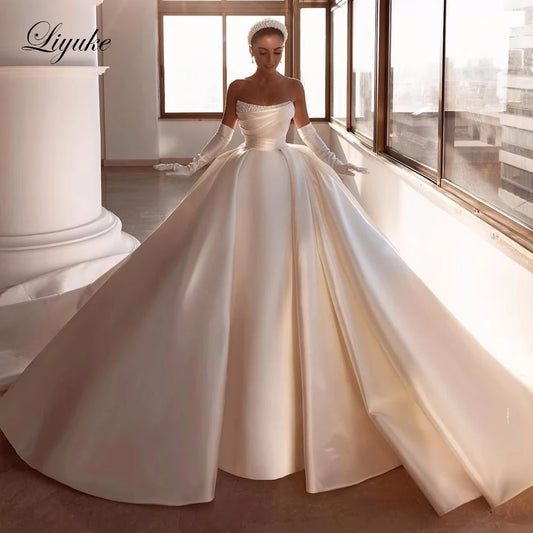 Liyuke Vestido de novia de satén escalonado de lujo, bata de boda sin mangas, cuentas, perlas, hombros descubiertos, falda de novia