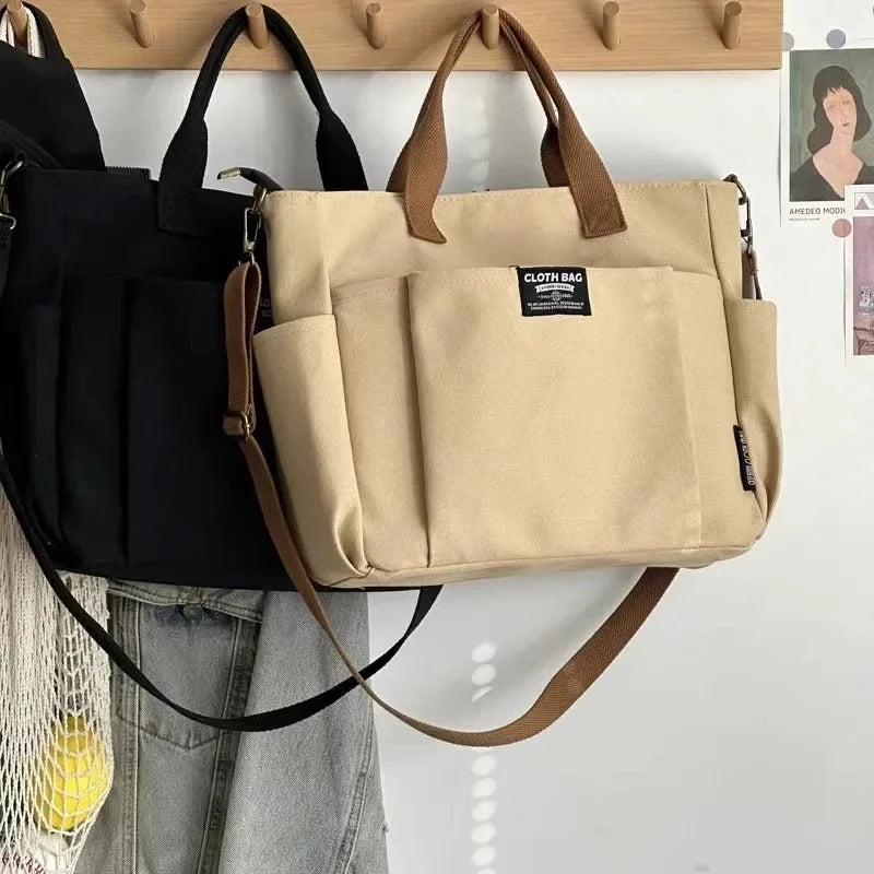 Urban Minimalist Female Student Tote Bag | Sophisticated Large Capacity Commuting Canvas Bag | Elegant Horizontal Single Shoulder & Diagonal Crossbody | Fashion-Forward Portable Portable Canvas Satchel Luxegan