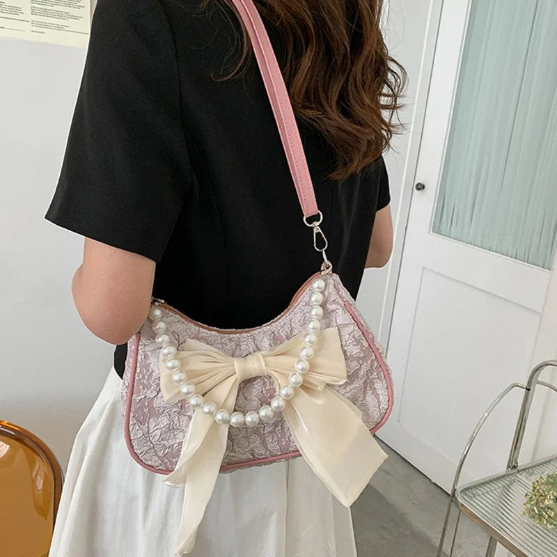 White Folds Pop Retro Bow Bag | Female Pearl Handle New Fashion Pearl Armpit Shoulder & Crossbody Bag Luxegan