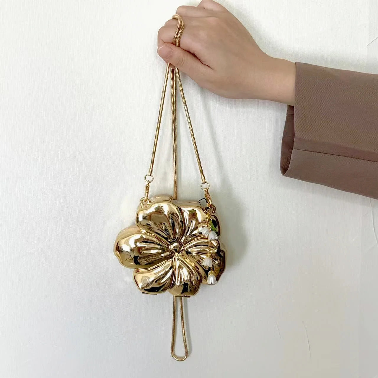 Rose Gold Acrylic Minaudiere with Lily of the Valley Charm | PVC Magnetic Messenger Bag Luxegan