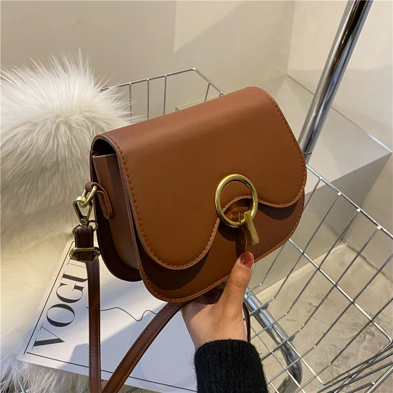 PU Leather Saddle Bag with Fashion Lock | Solid Color Flap Crossbody Purse Luxegan