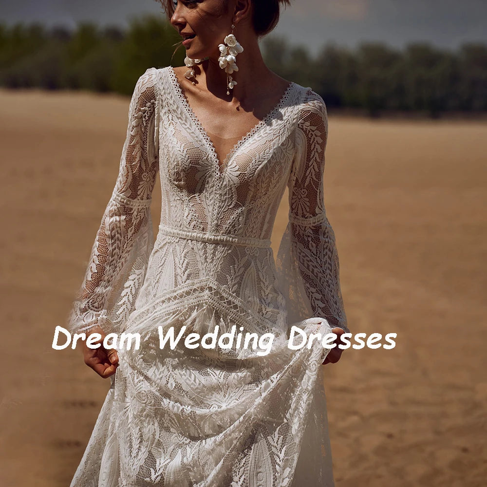 Exquisite Custom V-Neck Flare Sleeve Bridal Gown | Vintage Backless Lace Mermaid Wedding Dress | Bohemian-Inspired Long Bride Dress with Ruffled Tassel Accents & Sweep Train Luxegan