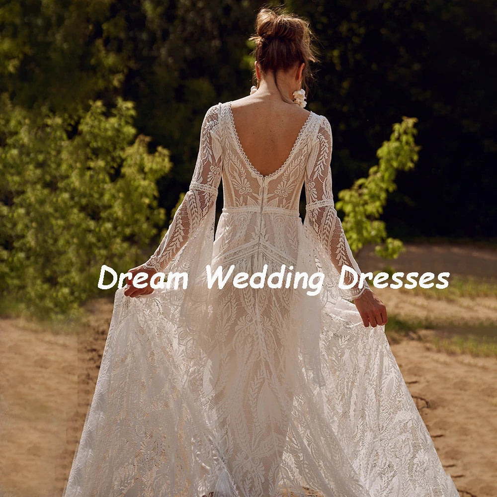 Exquisite Custom V-Neck Flare Sleeve Bridal Gown | Vintage Backless Lace Mermaid Wedding Dress | Bohemian-Inspired Long Bride Dress with Ruffled Tassel Accents & Sweep Train Luxegan