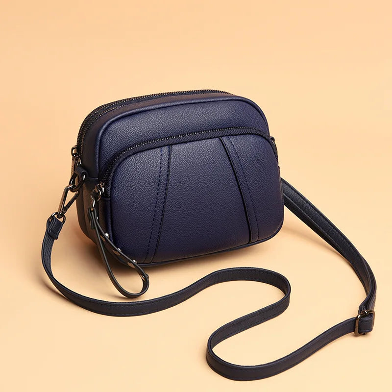 Fashionable Rivet-Accent Mobile Phone Bag | Sophisticated Solid-Color Shell Handbag | Elegant Soft PU Leather Crossbody | "Dignified" Small Square Purse for Versatile Daily Styling Luxegan
