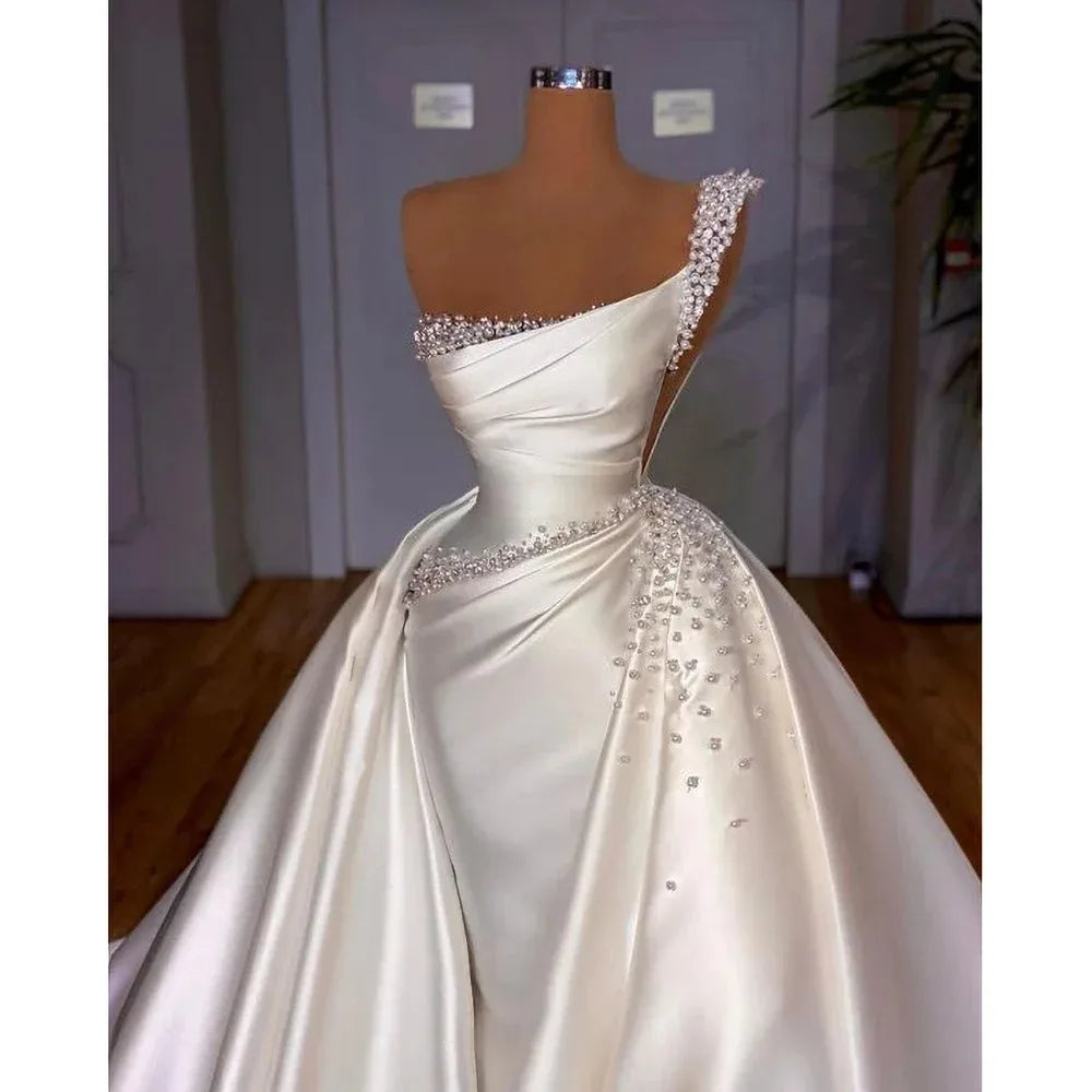 Luxury Satin Pearls Mermaid Wedding Dress | Convertible One-Shoulder Africa Bridal Gown | Bead & Crystal Floor-Length Dress with Detachable Skirt Luxegan