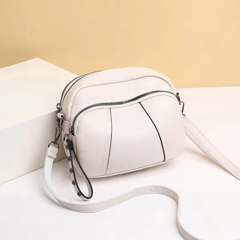 Fashionable Rivet-Accent Mobile Phone Bag | Sophisticated Solid-Color Shell Handbag | Elegant Soft PU Leather Crossbody | "Dignified" Small Square Purse for Versatile Daily Styling Luxegan