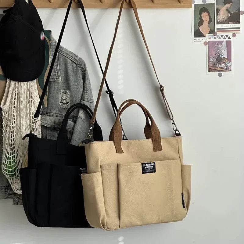 Urban Minimalist Female Student Tote Bag | Sophisticated Large Capacity Commuting Canvas Bag | Elegant Horizontal Single Shoulder & Diagonal Crossbody | Fashion-Forward Portable Portable Canvas Satchel Luxegan