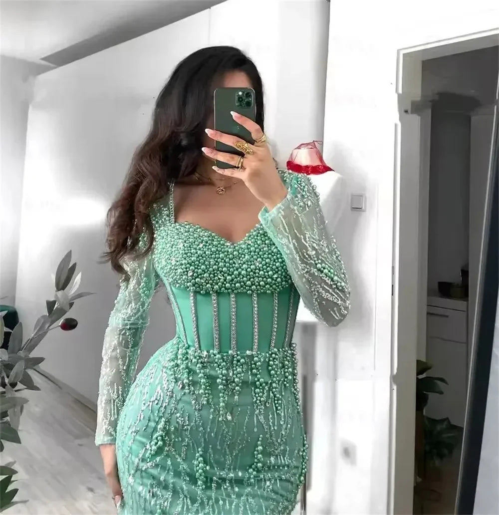 Luxury Mint Green Mermaid Evening Gown | Dubai Heavy Beaded Pearls Formal Party Dress | Exquisite Long Sleeve Illusion Corset Prom Gown | Sequin Satin Ankle-Length Trumpet Dress Luxegan