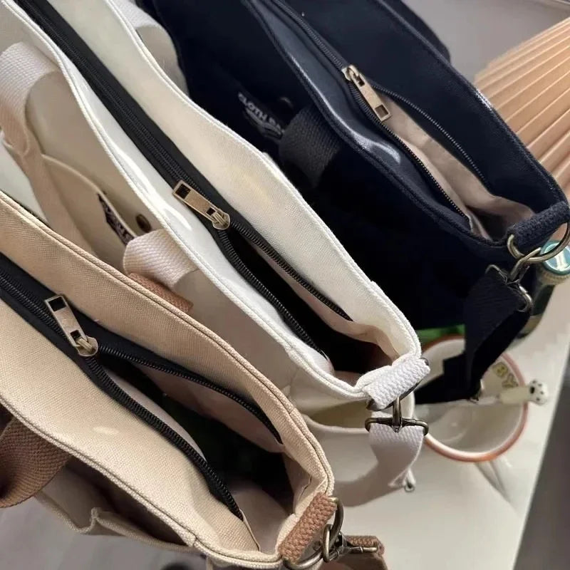 Urban Minimalist Female Student Tote Bag | Sophisticated Large Capacity Commuting Canvas Bag | Elegant Horizontal Single Shoulder & Diagonal Crossbody | Fashion-Forward Portable Portable Canvas Satchel Luxegan