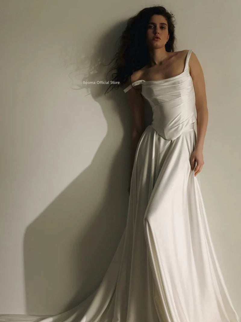 Elegant Lustrous Satin A-Line Wedding Dress | Simple Spaghetti Strap Square Neck Bridal Gown | Classic Pleated Floor-Length Bride Dress | Model M1-250707-10 Custom Lace-Up Gown Luxegan