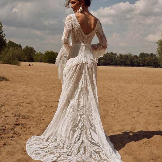 Exquisite Custom V-Neck Flare Sleeve Bridal Gown | Vintage Backless Lace Mermaid Wedding Dress | Bohemian-Inspired Long Bride Dress with Ruffled Tassel Accents & Sweep Train Luxegan